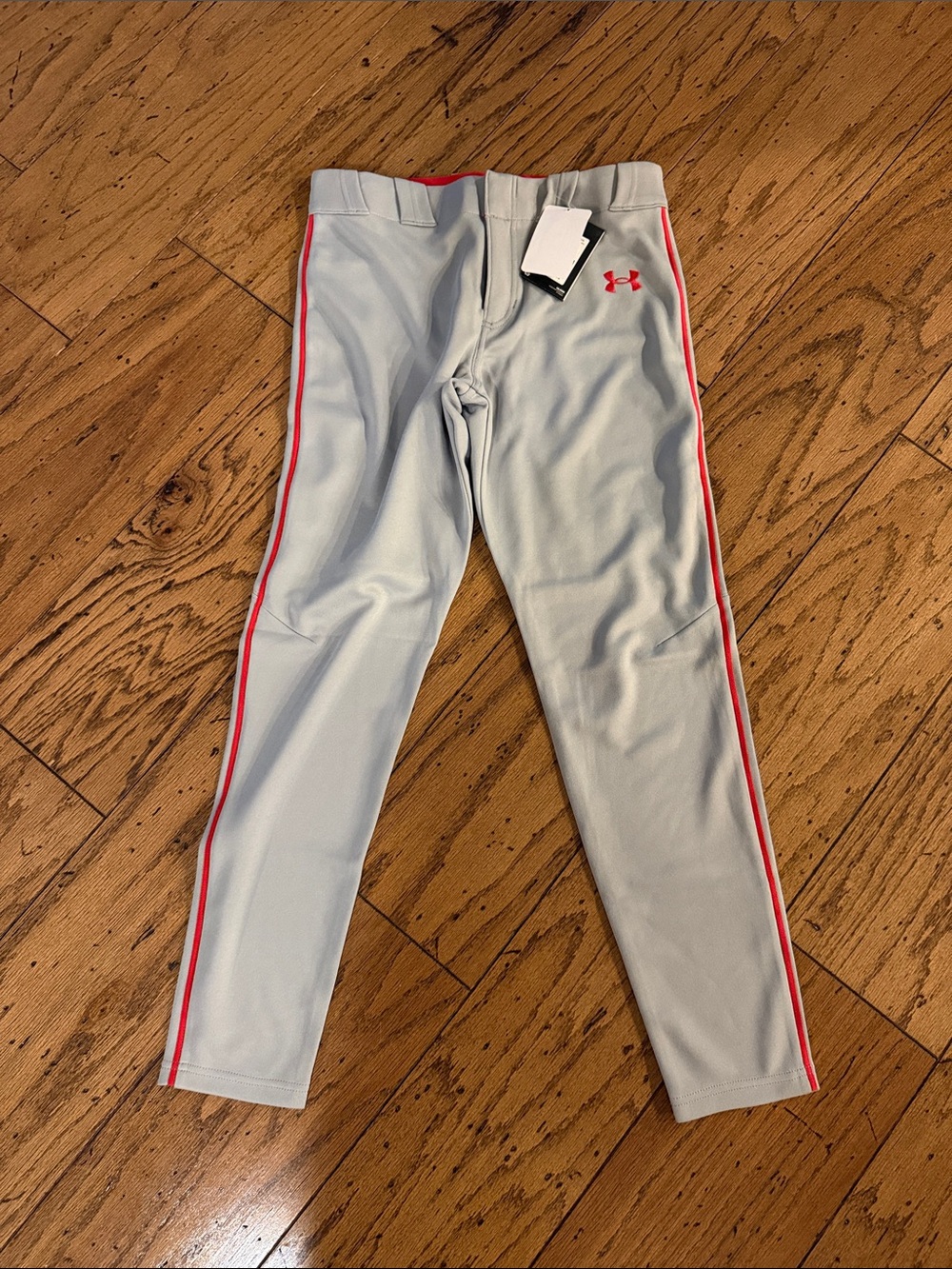 Under Armour Youth Light Gray Baseball Pants with Red Piping